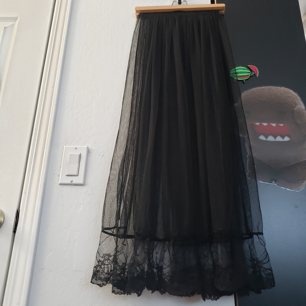 Sheer black and lace skirt